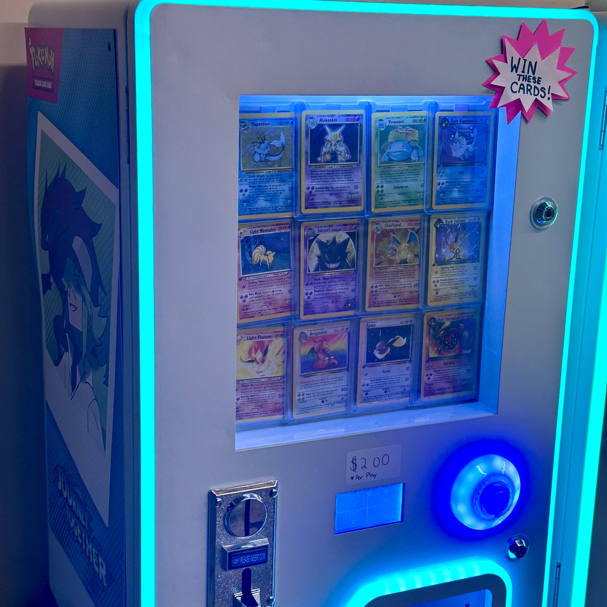 Card vending machine with classic Pokemon cards lit by cyan neon