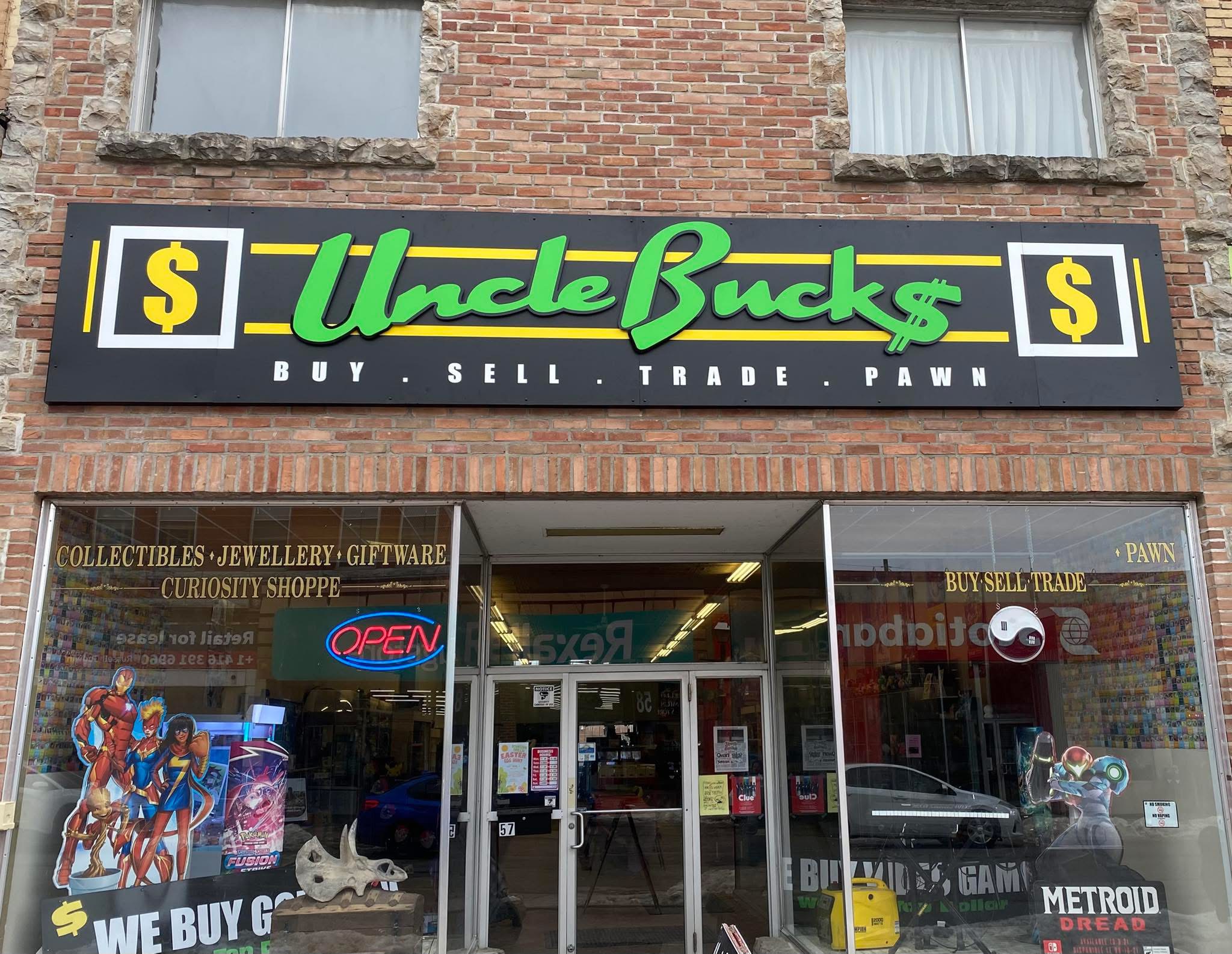 Uncle Buck's Orillia storefront showing collectibles, jewellery, and giftware displays in the shop windows